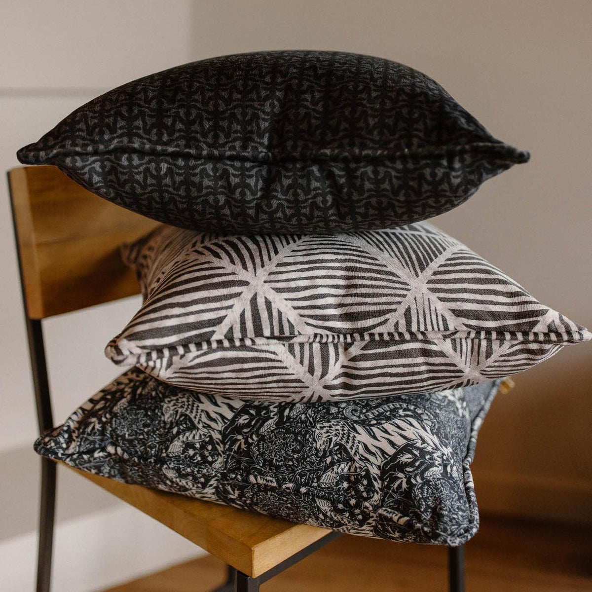 three pillows stacked on top of each other
