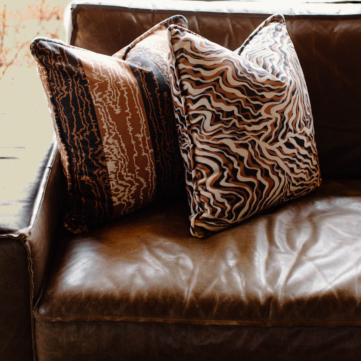 Yari Onyx Caramel Throw Pillow